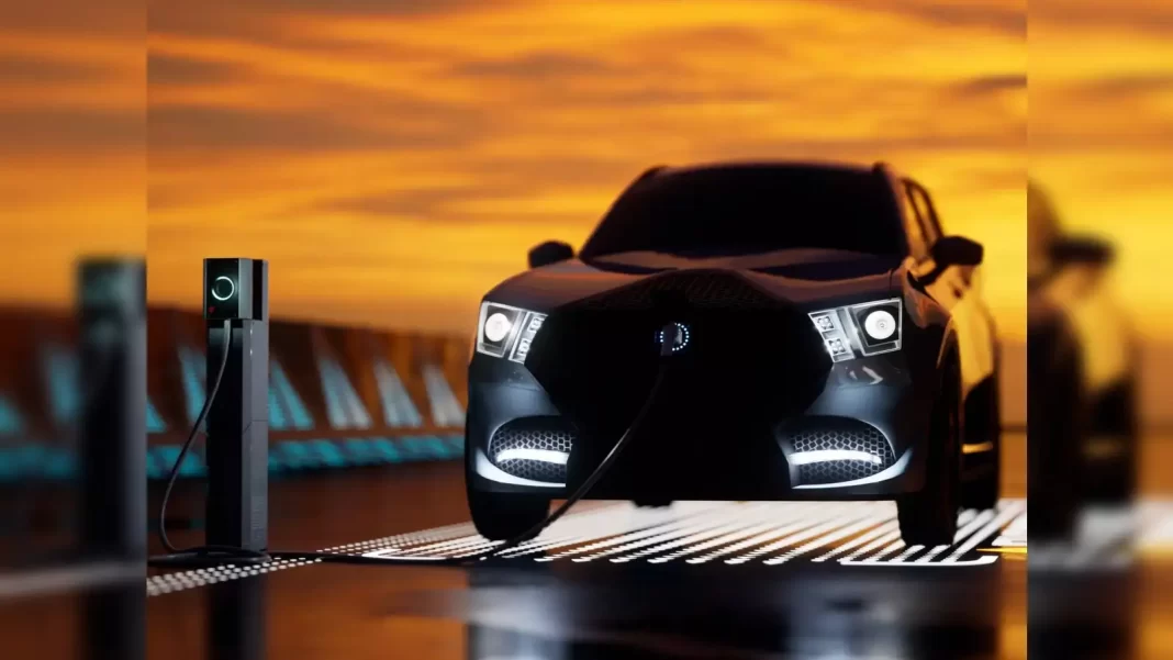 Close-up glimpse of a sleek electric vehicle with lights off, highlighting its modern design.