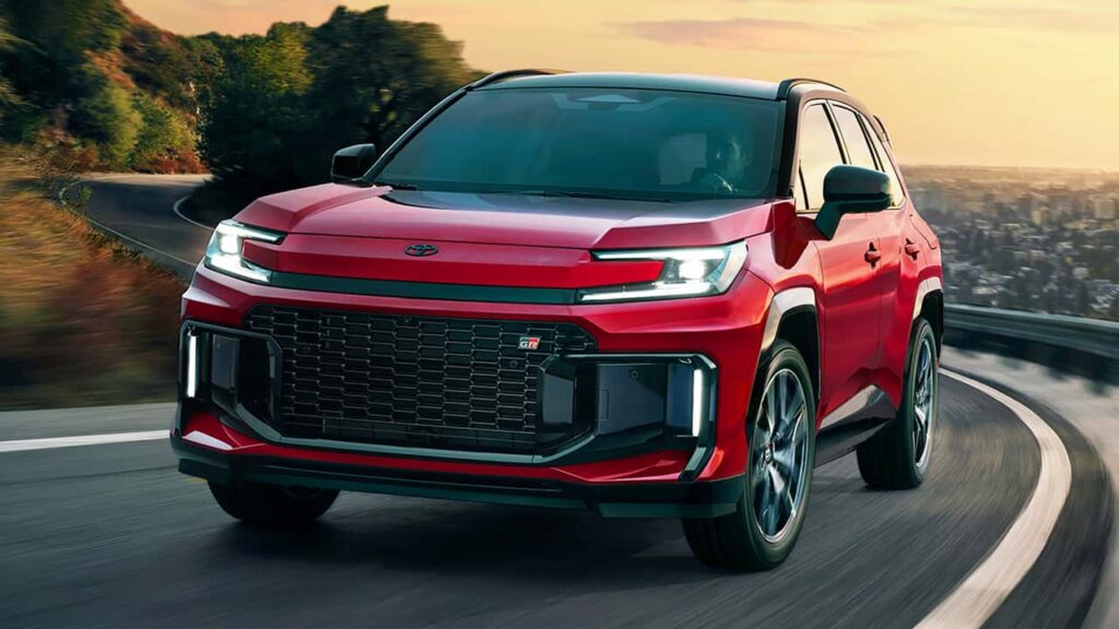 Red 2026 Toyota RAV4 GR Sport driving on the road, showcasing its sporty design and dynamic performance.